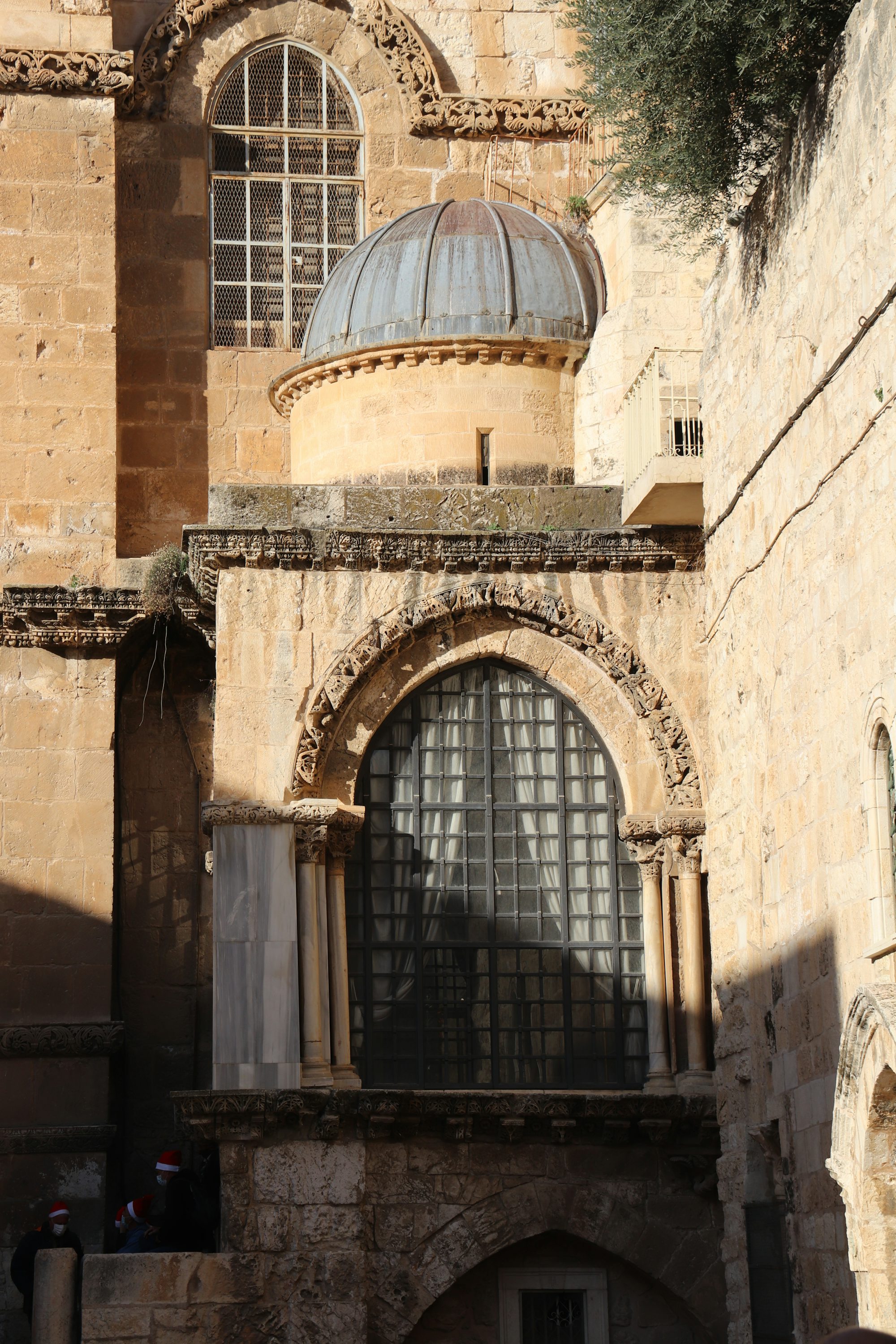 Candles burning inside the Church of the Holy Sepulchre in Jerusalem